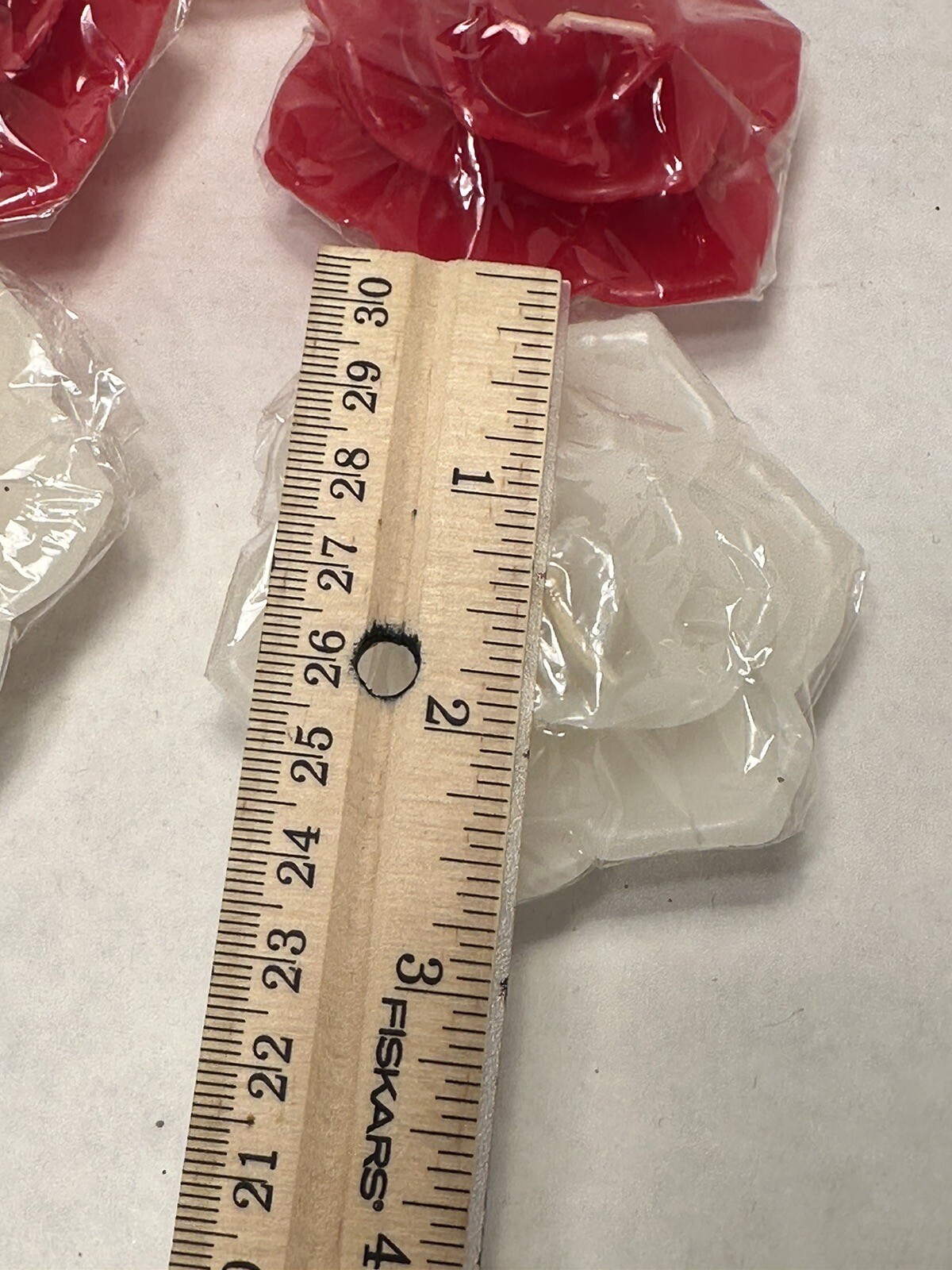 5 small rose shaped candles pink red white