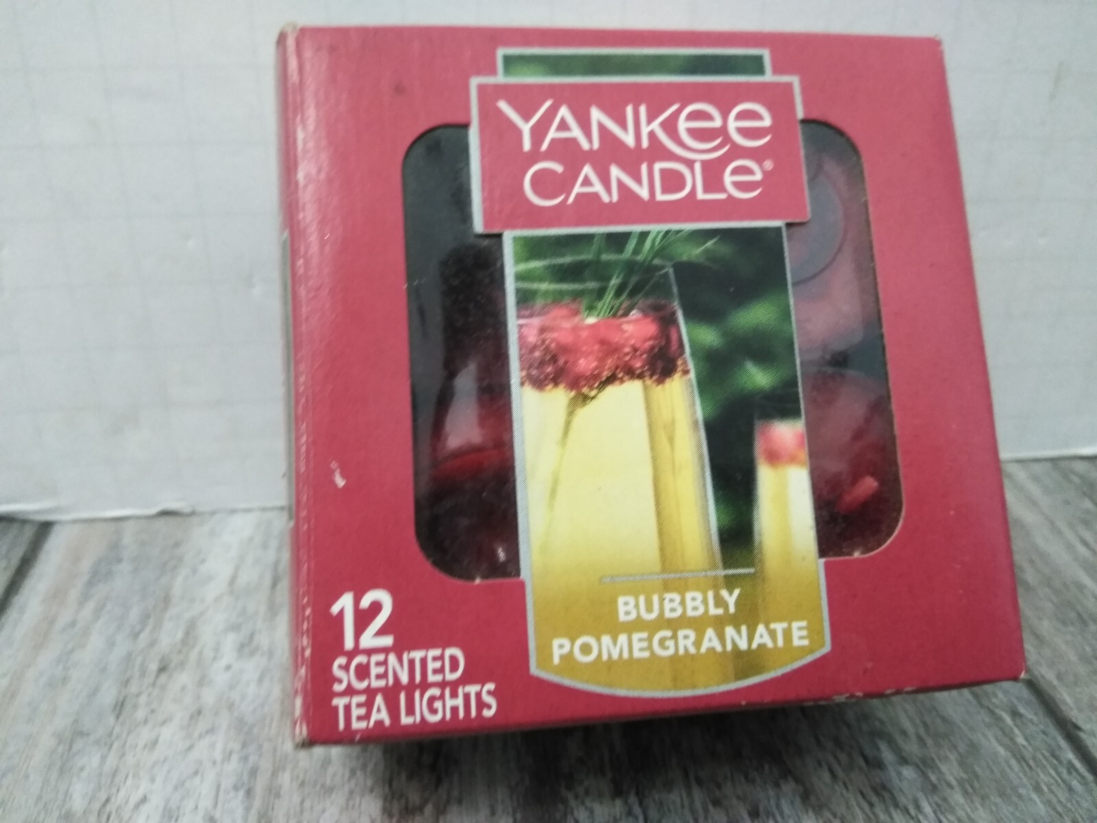 RETIRED YANKEE CANDLE BUBBLY POMEGRANATE TEA LIGHTS (10 UNIT IN BOX)