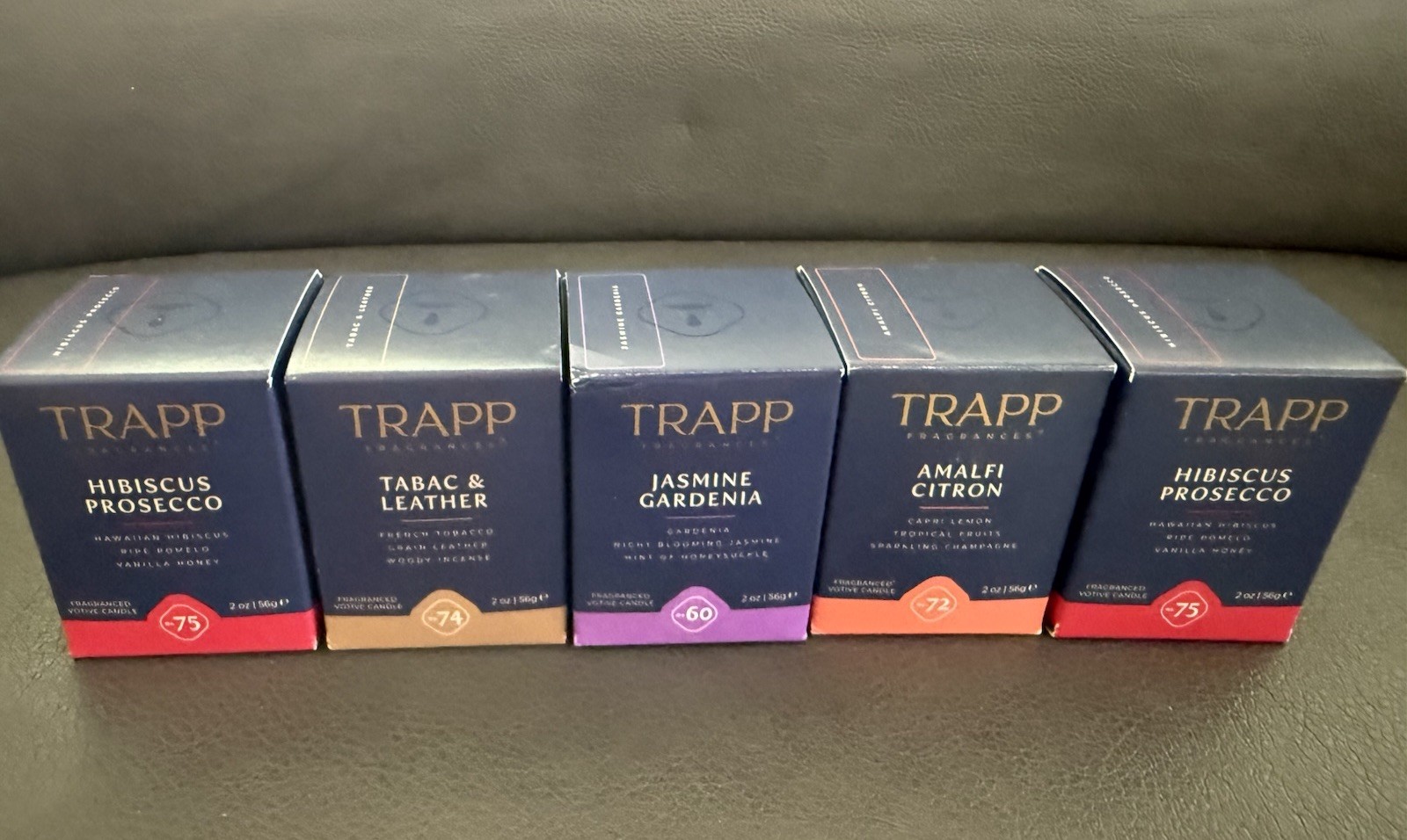 8-TRAPP Votive Candles In Multiple Scents. The Votives Are Sold Individually