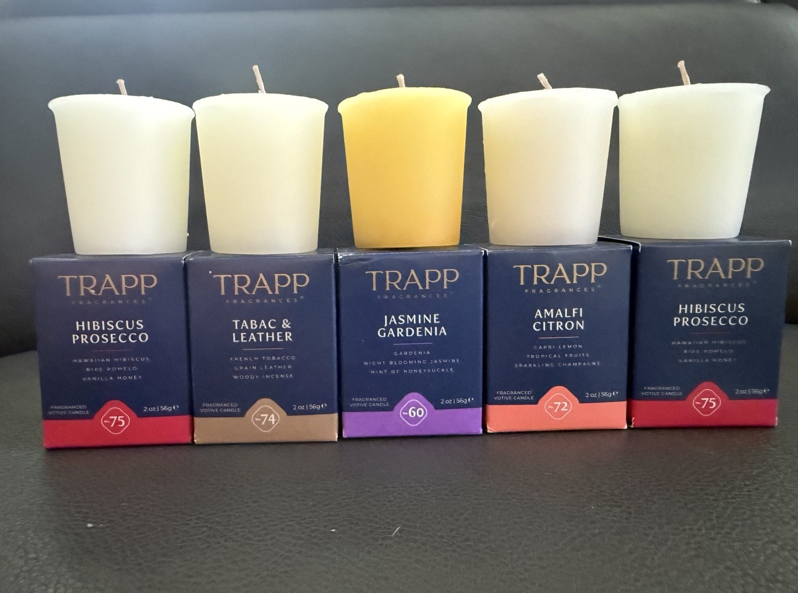 8-TRAPP Votive Candles In Multiple Scents. The Votives Are Sold Individually