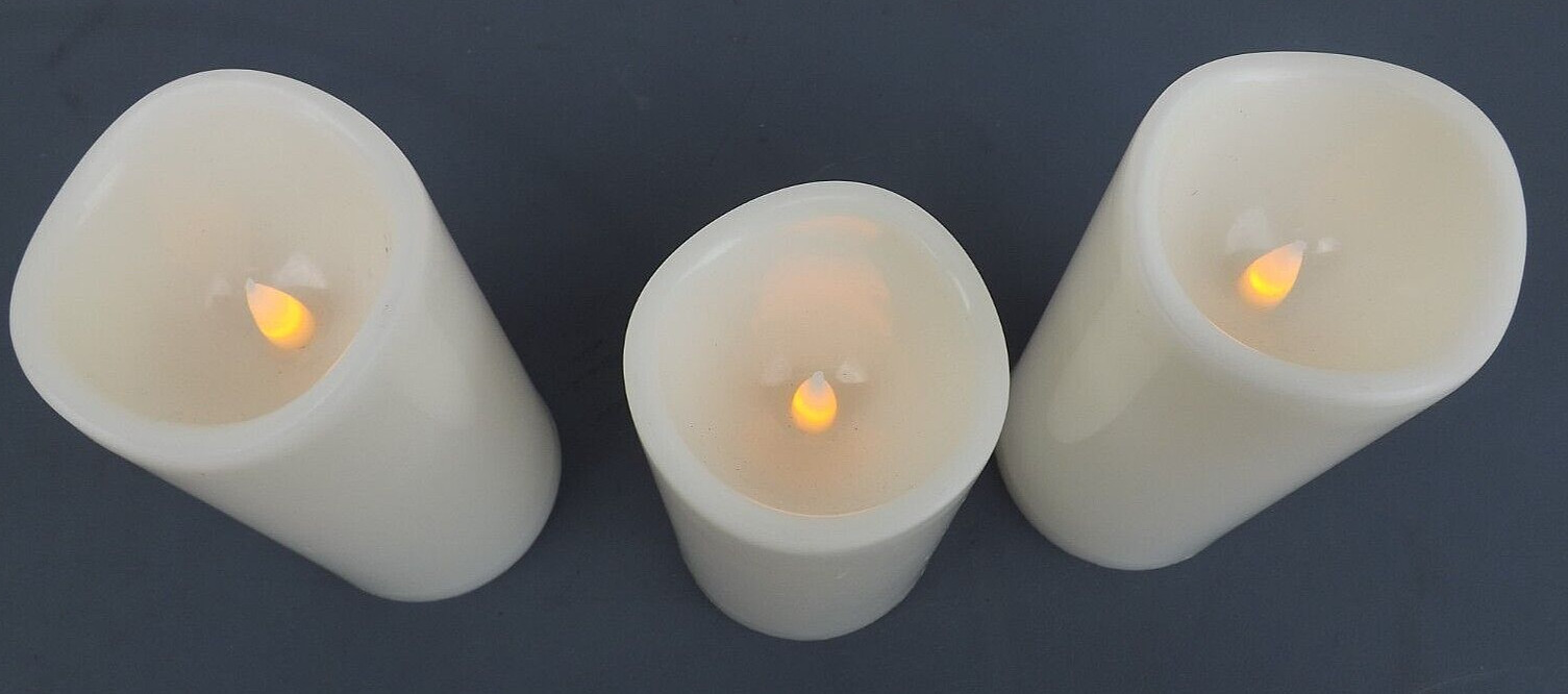 3 IVORY CANDLES FLICKER FLAME – EACH USE 3 AAA BATTERIES -1 @ 5″ & 2 @ 5 3/4″ HI