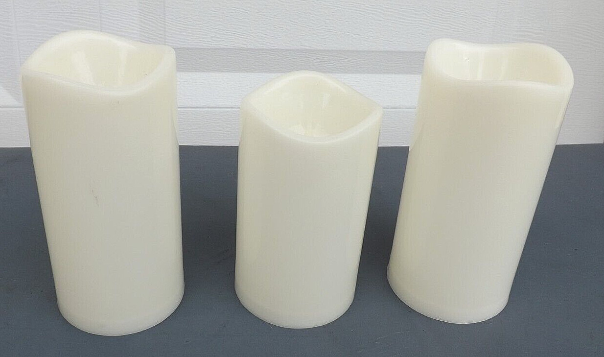 3 IVORY CANDLES FLICKER FLAME – EACH USE 3 AAA BATTERIES -1 @ 5″ & 2 @ 5 3/4″ HI