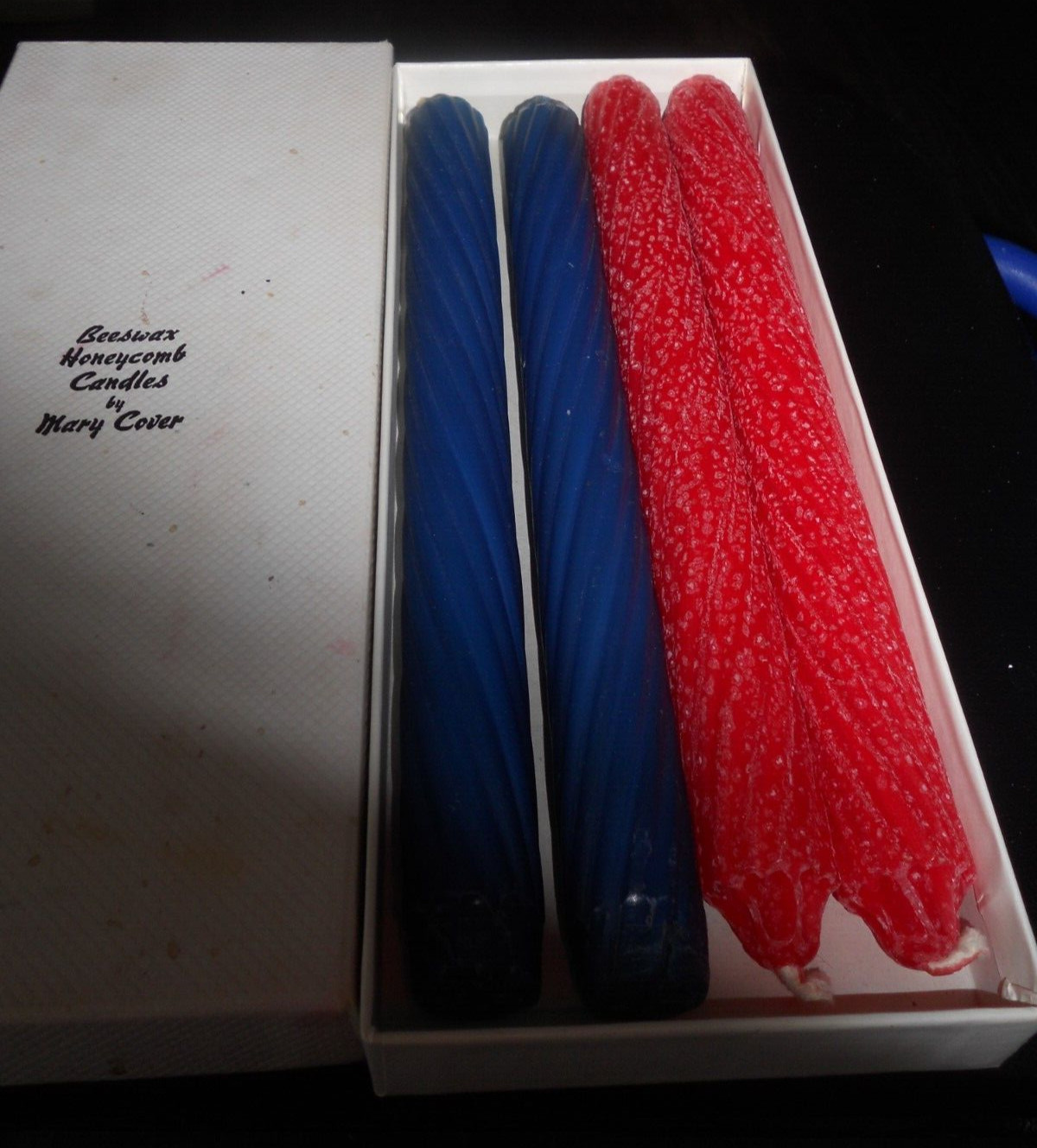 four beeswax candles 2 red and 2 blue 10 1/2 in patriotic colors