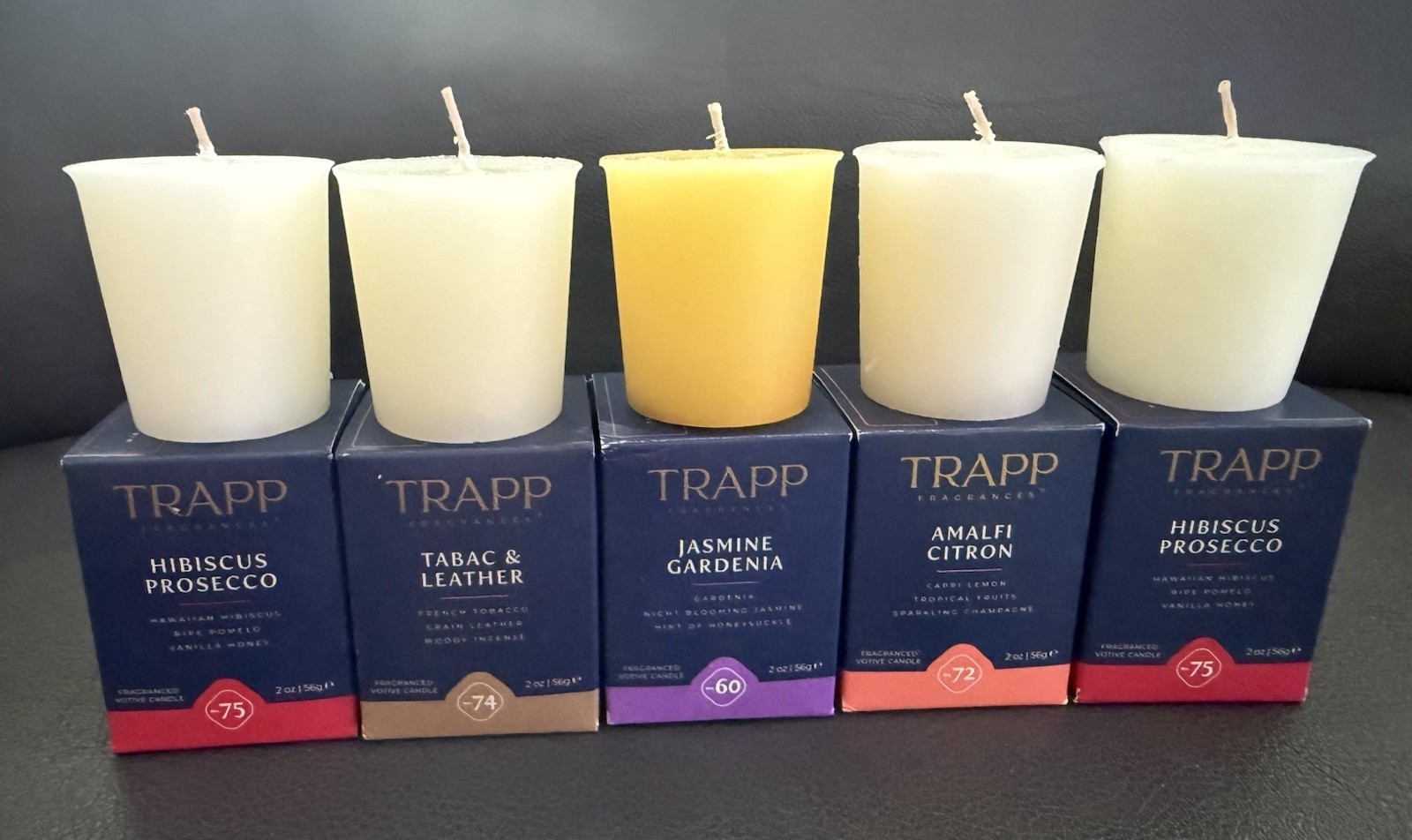 8-TRAPP Votive Candles In Multiple Scents. The Votives Are Sold Individually