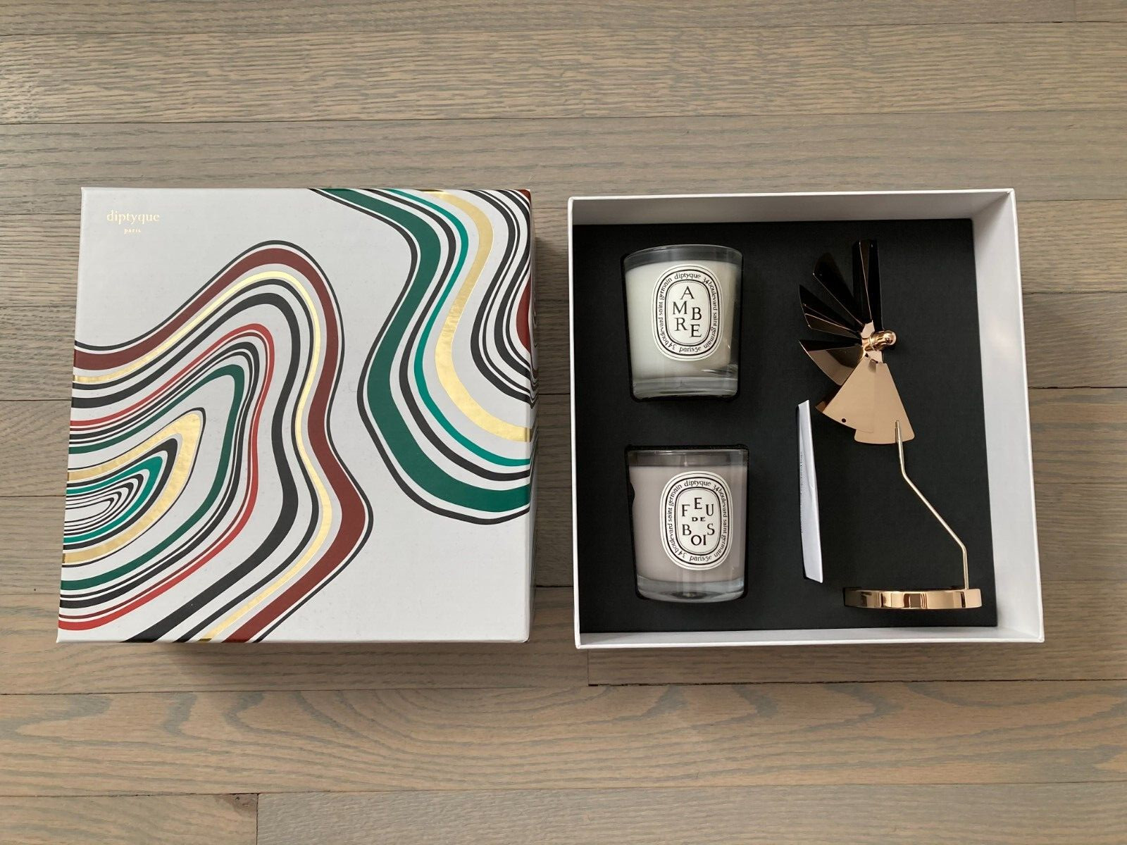 Limited Edition Dyptique scented candle set with carrousel Ambre Feu De Bois