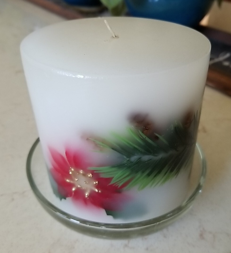 Poinsettia and Juniper Botanical Pillar Candle In Glass Holder. 4 1/2 Inches.