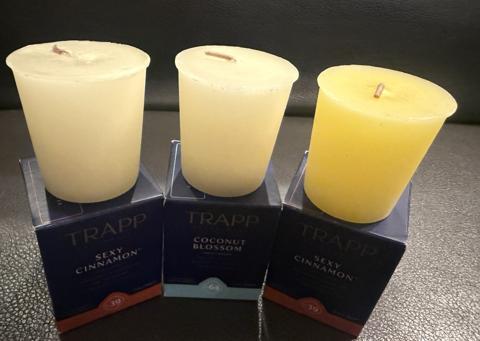 8-TRAPP Votive Candles In Multiple Scents. The Votives Are Sold Individually