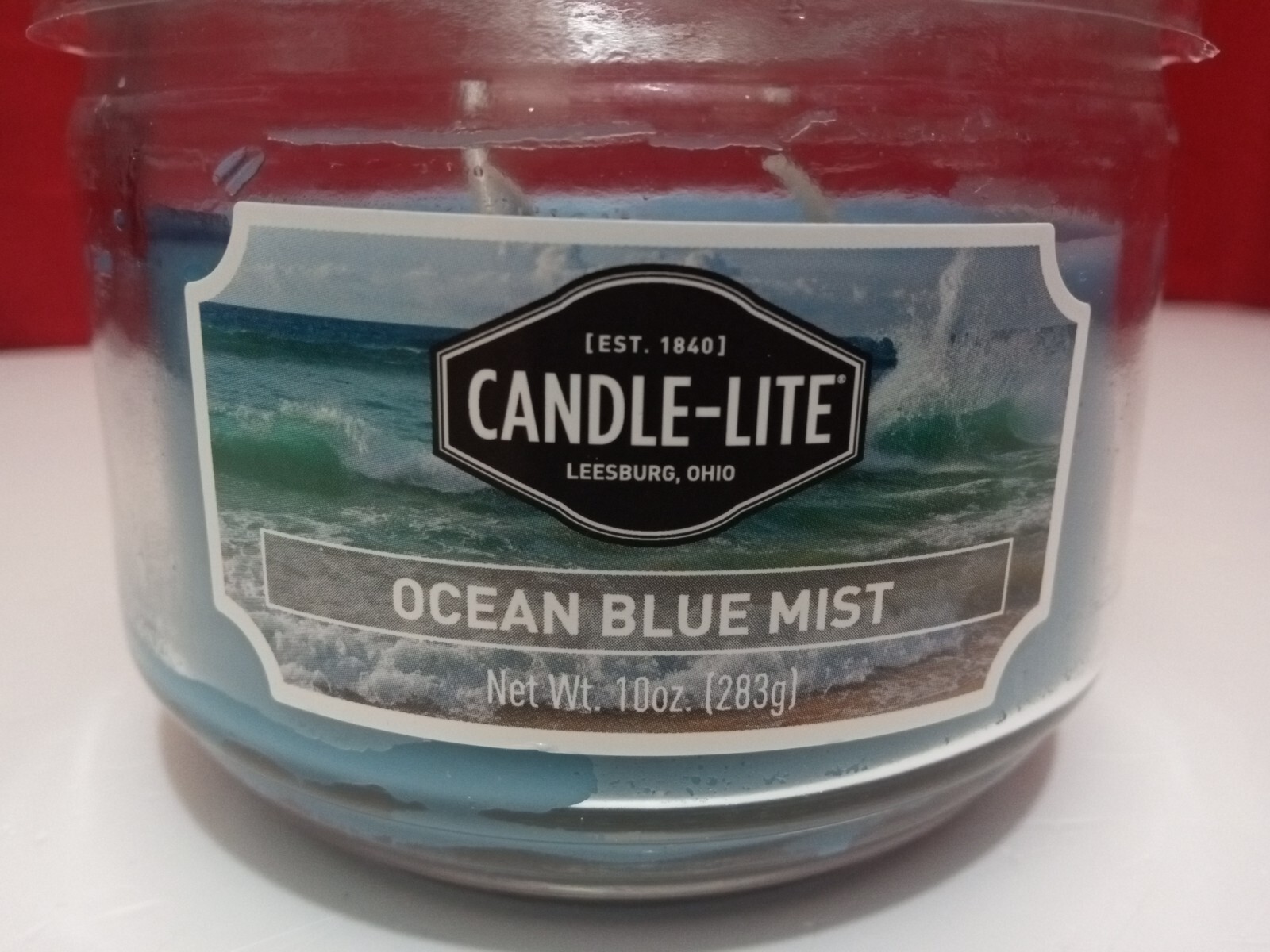 CANDLE-LITE Ocean Blue Mist Scented 20-40Hour Burning Candle Jar 10 Oz 1 Count