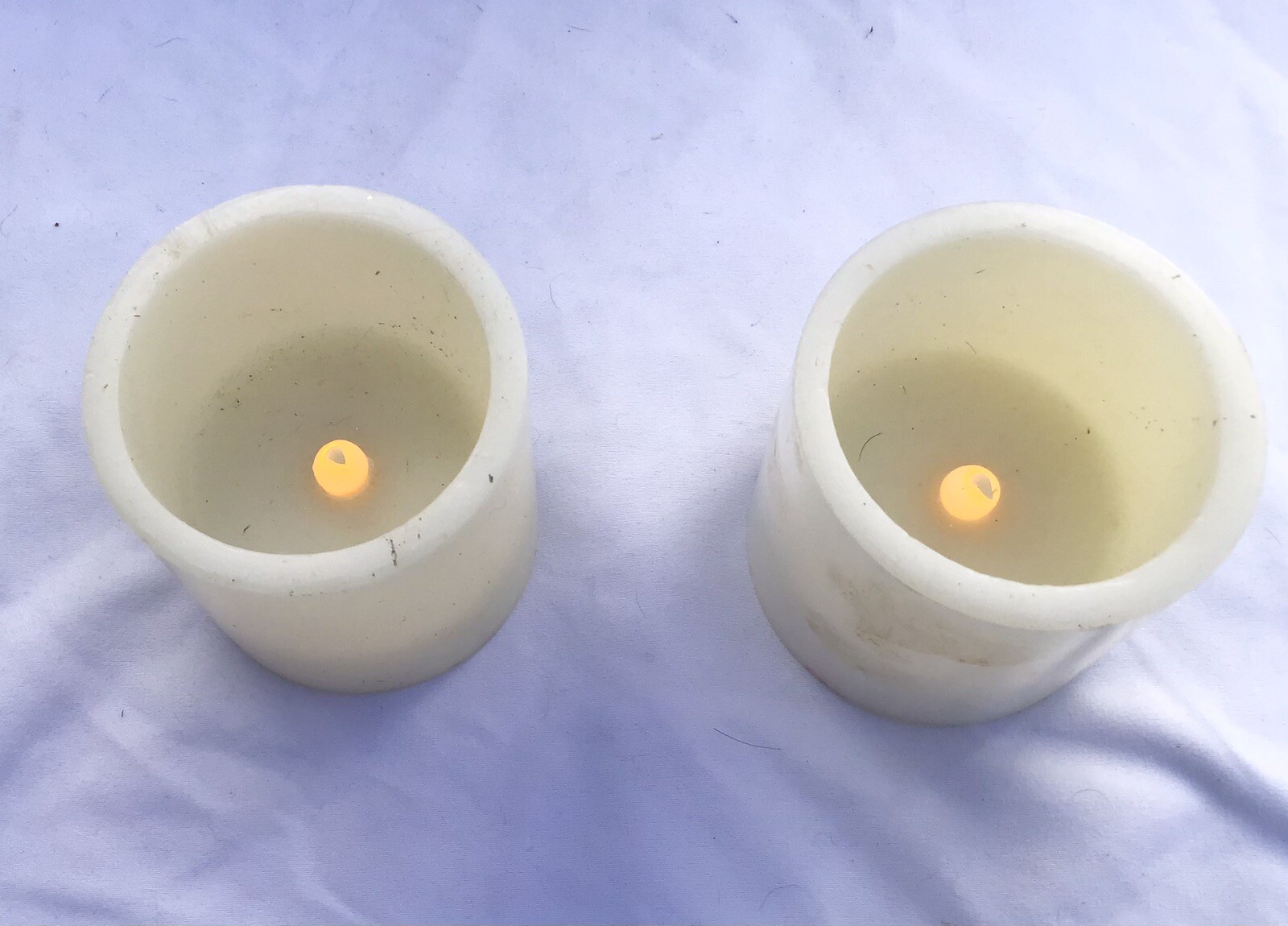 Two Pulsing Flameless Wick Pillar Candles 3 AAA Batteries Ivory Wax Coating