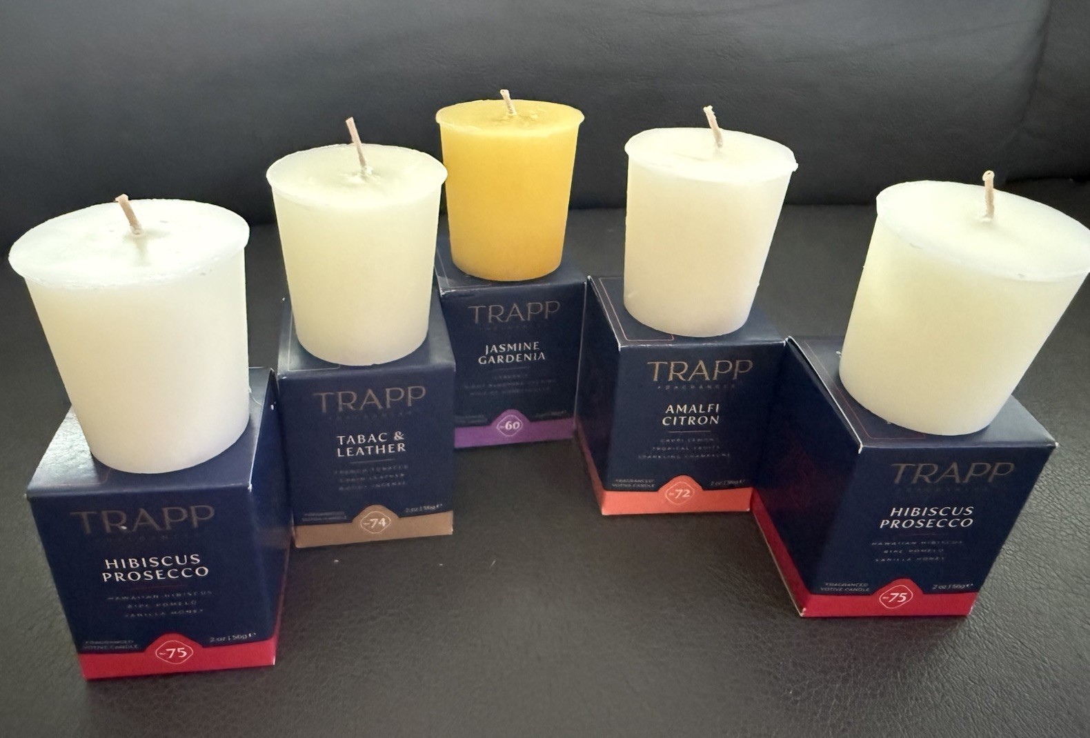 8-TRAPP Votive Candles In Multiple Scents. The Votives Are Sold Individually