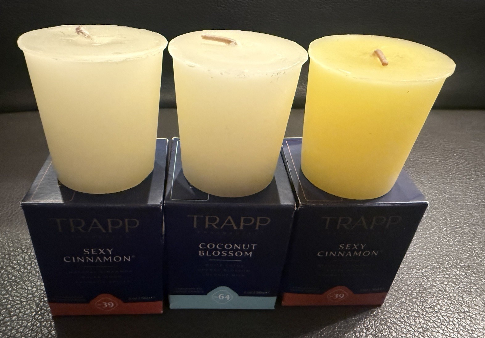8-TRAPP Votive Candles In Multiple Scents. The Votives Are Sold Individually