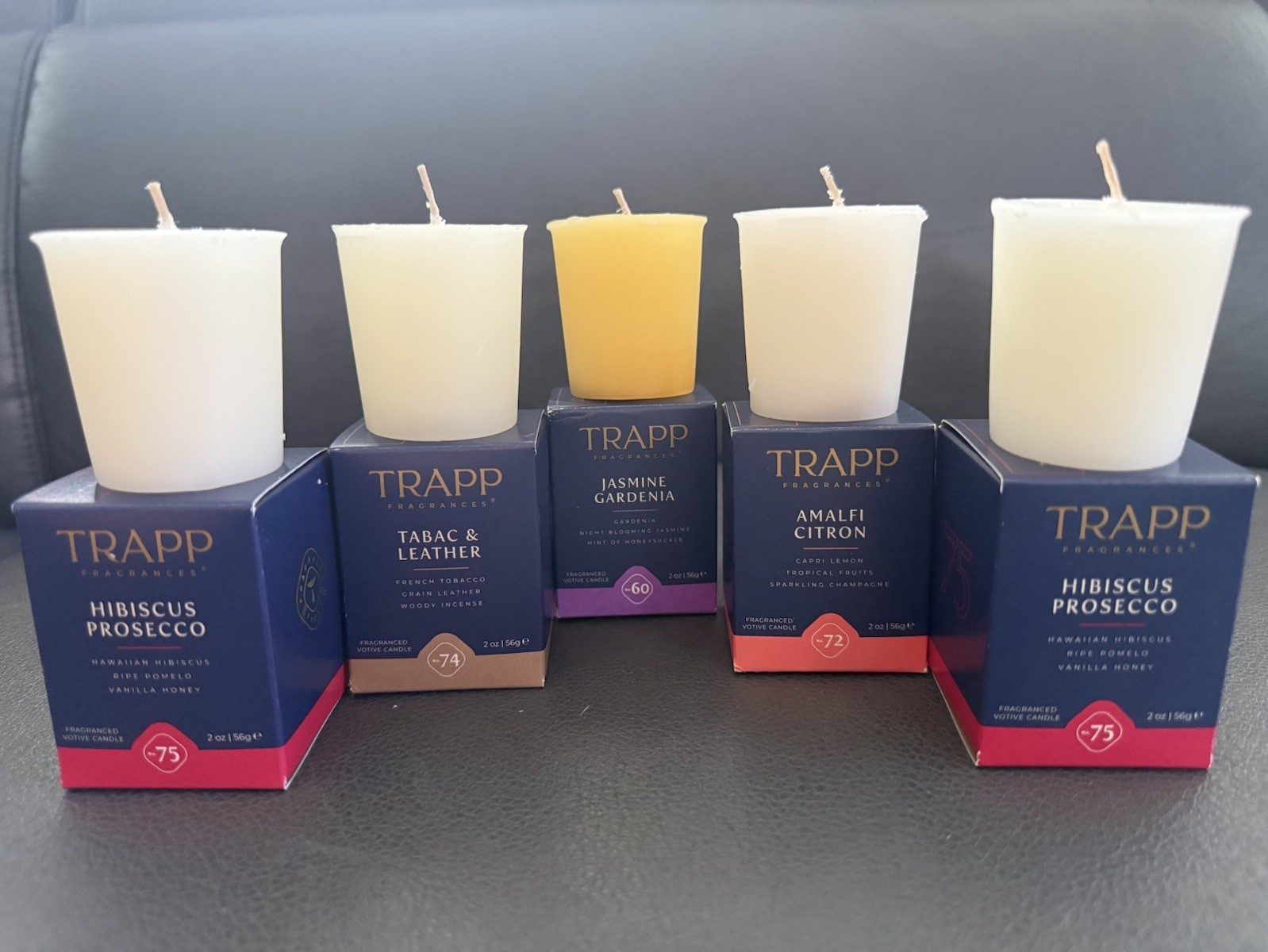 8-TRAPP Votive Candles In Multiple Scents. The Votives Are Sold Individually