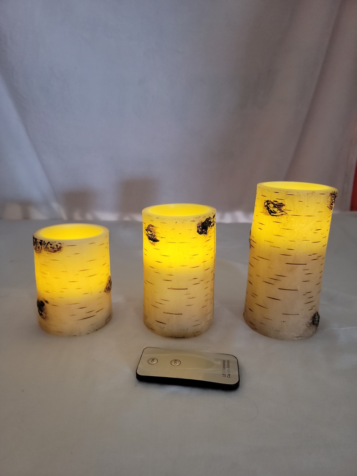 3 Birch Candles W/ Electronic Wick. Remote, runs On 3 AAA Batteries
