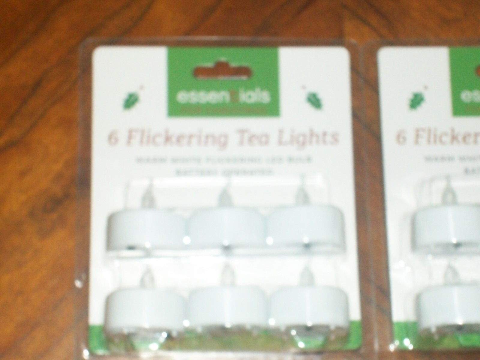 NIB Christmas ESSENTIALS 12 FLICKERING TEA LIGHTS WARM WHITE LED BULB BATTERY