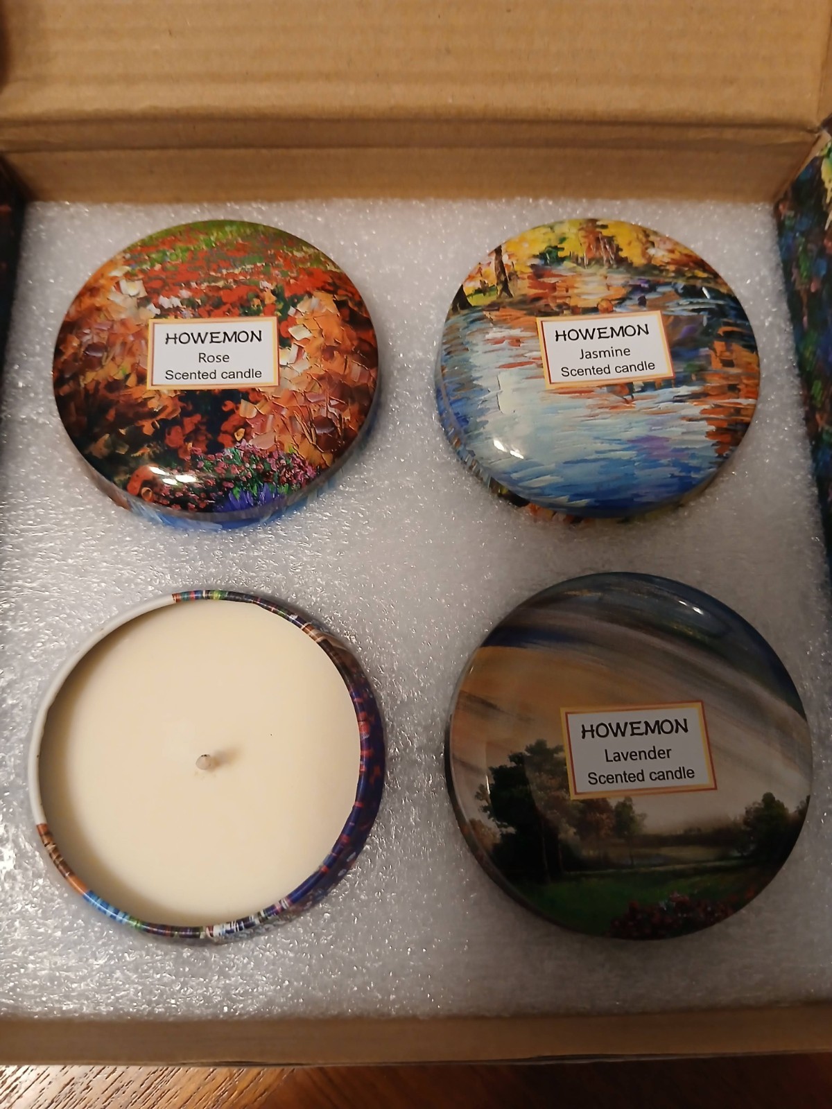 Howemon scented candle jars in decorative box