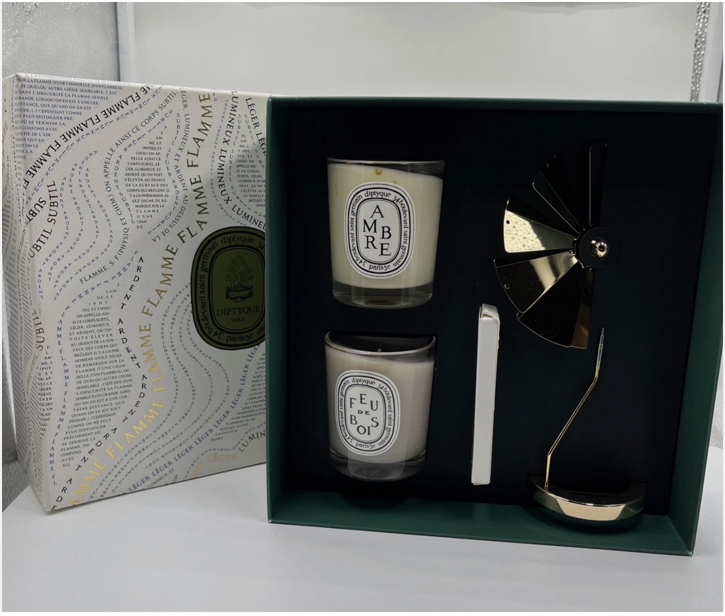 Diptyque Carousel Set With Two Candles: Ambre And Feu De Bois2x2.4oz As Pictured
