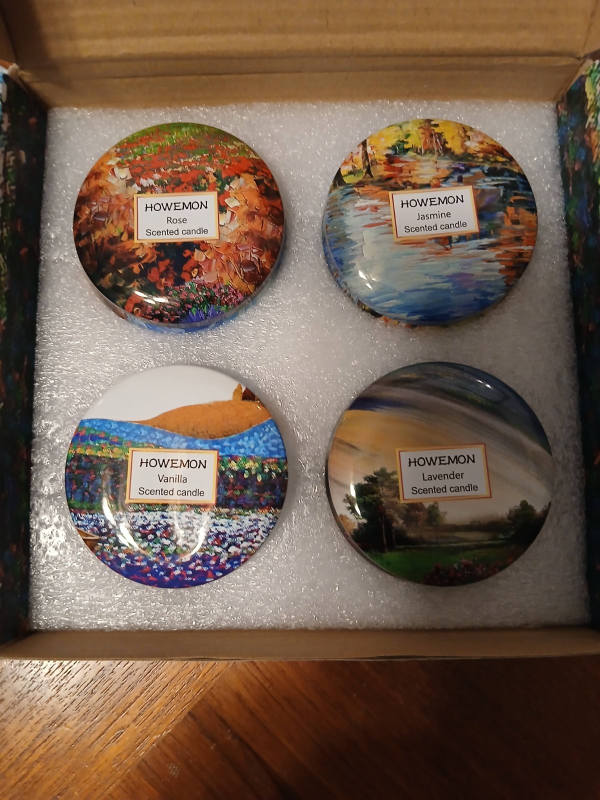 Howemon scented candle jars in decorative box