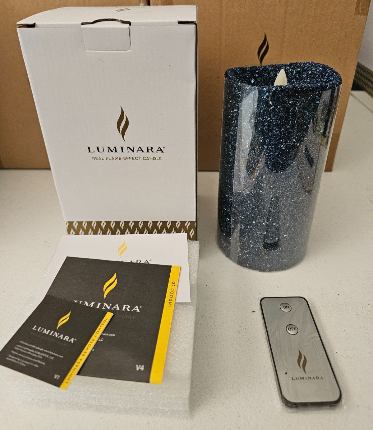 Blue Glitter Luminara 3.5″ X 7″ Flameless Pilar Candle w/Remote