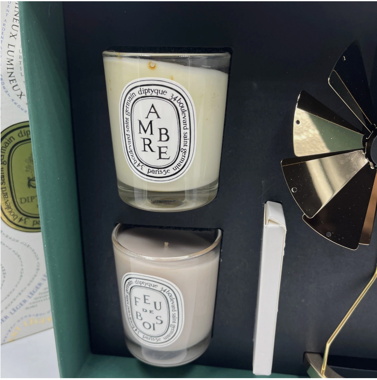 Diptyque Carousel Set With Two Candles: Ambre And Feu De Bois2x2.4oz As Pictured