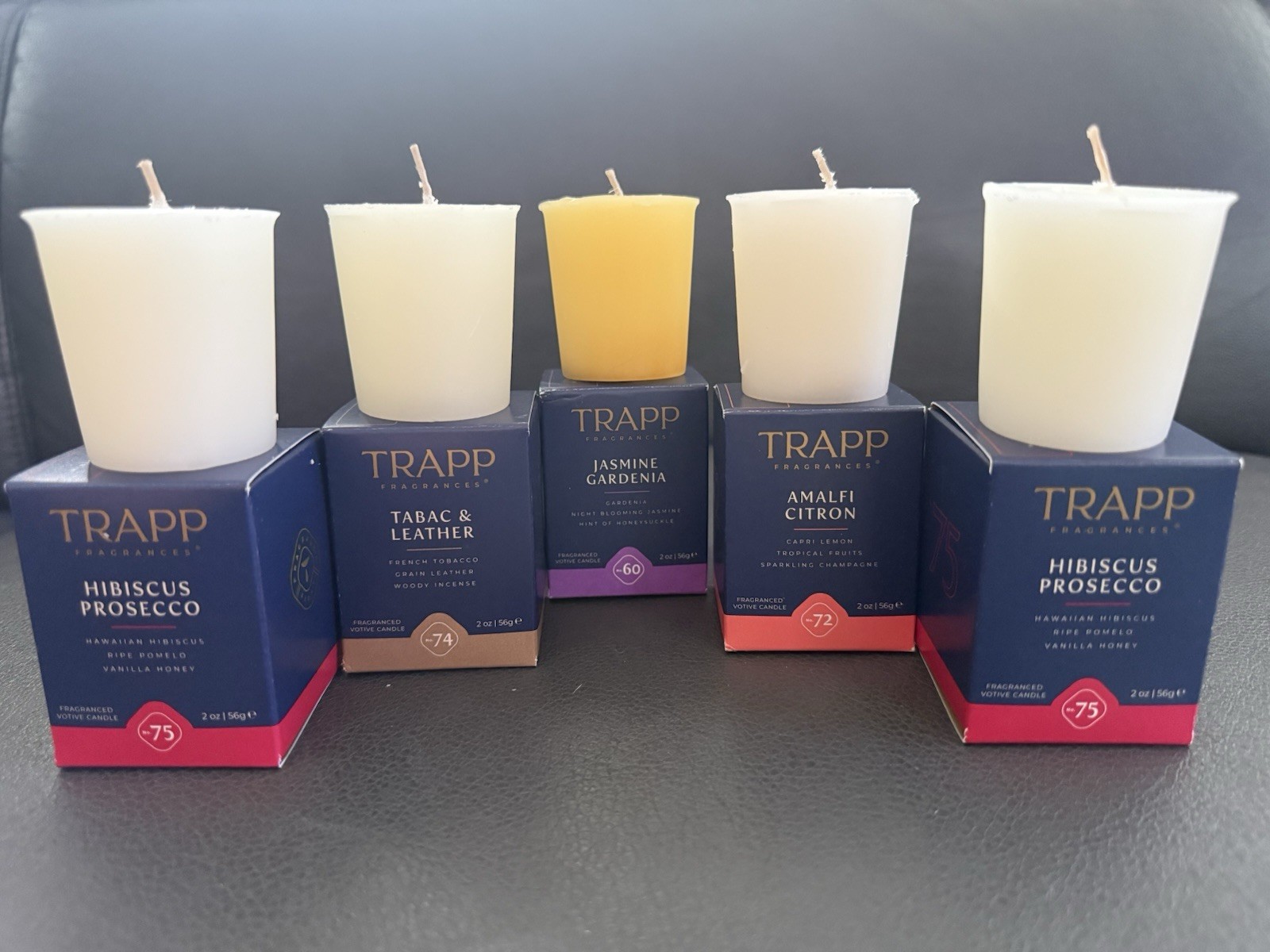 8-TRAPP Votive Candles In Multiple Scents. The Votives Are Sold Individually