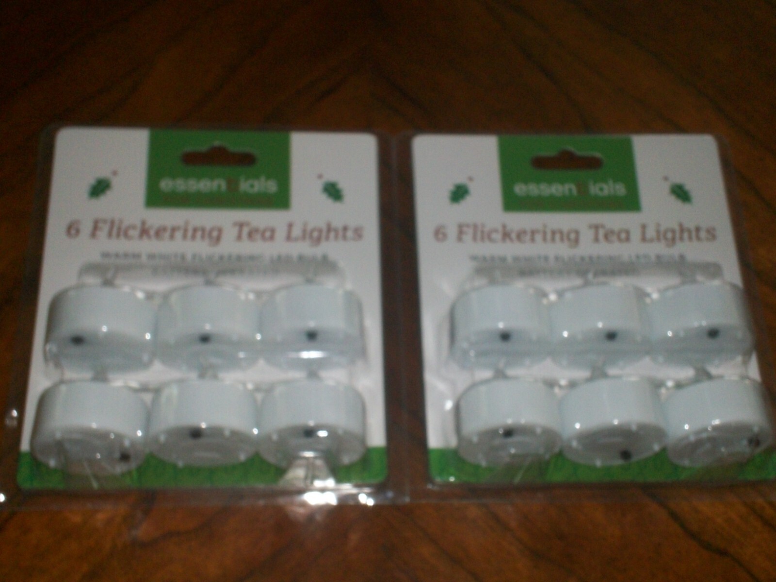 NIB Christmas ESSENTIALS 12 FLICKERING TEA LIGHTS WARM WHITE LED BULB BATTERY