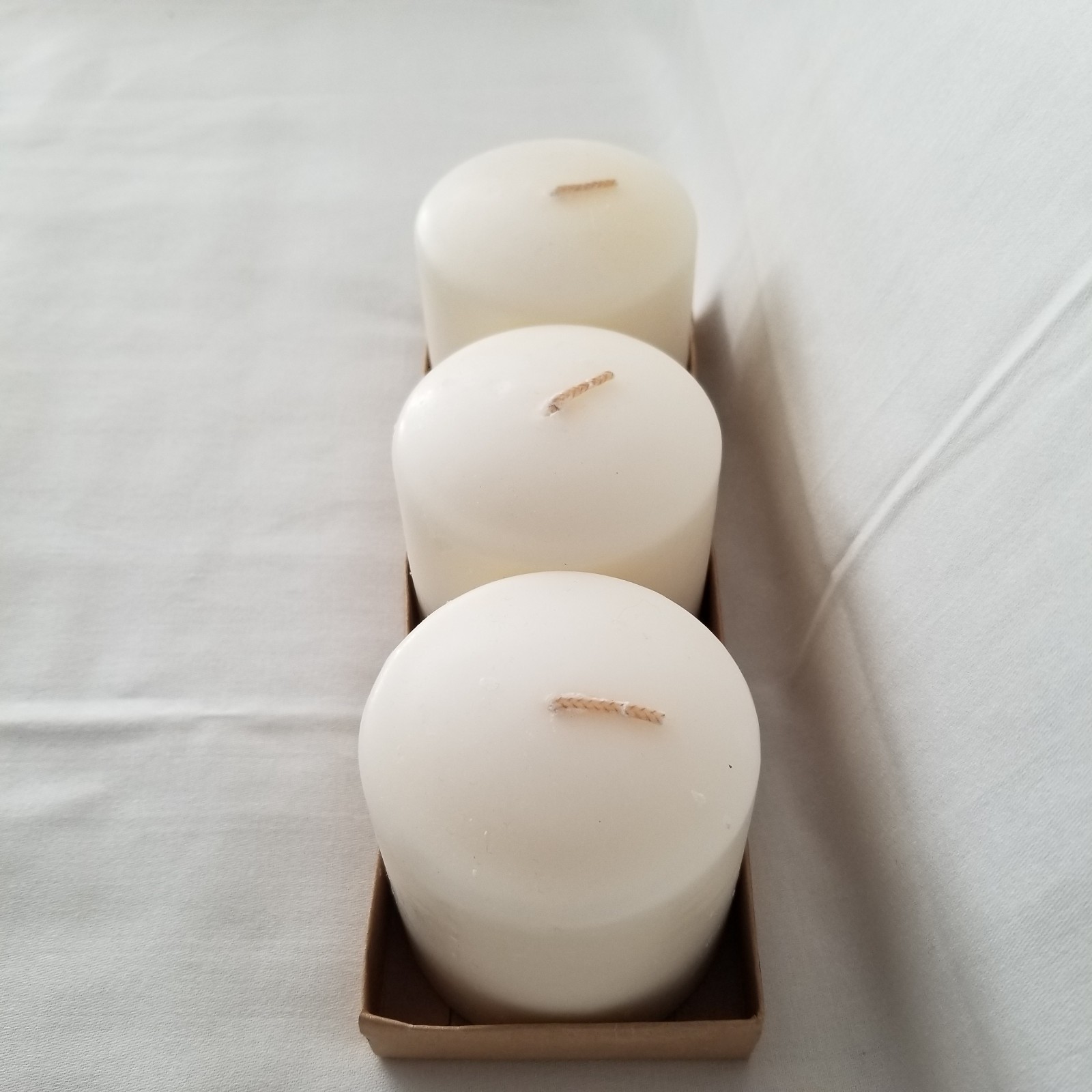 3 – Off White 3 x 3 inch Piller Candles New in Open Box Unscented