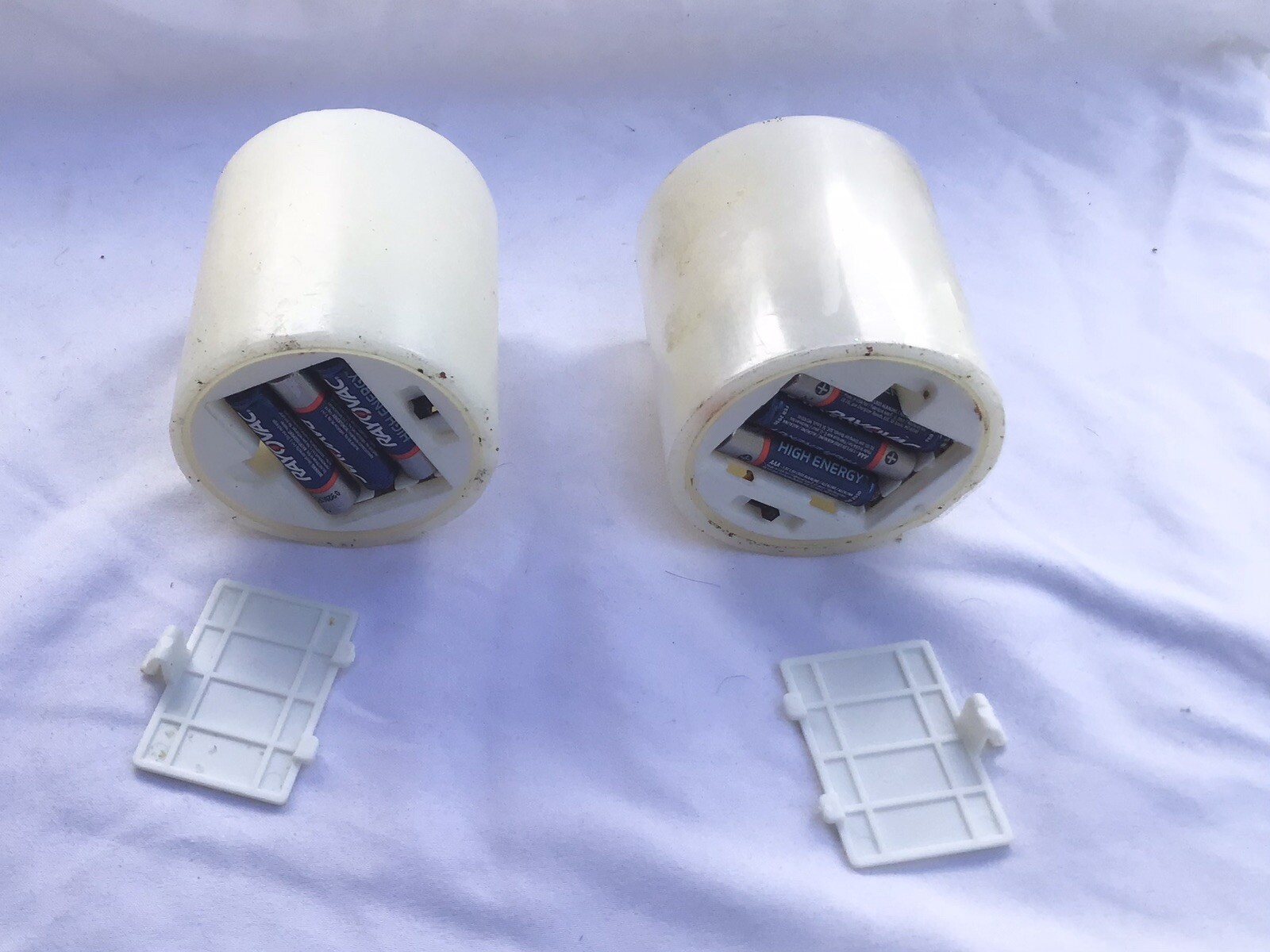 Two Pulsing Flameless Wick Pillar Candles 3 AAA Batteries Ivory Wax Coating