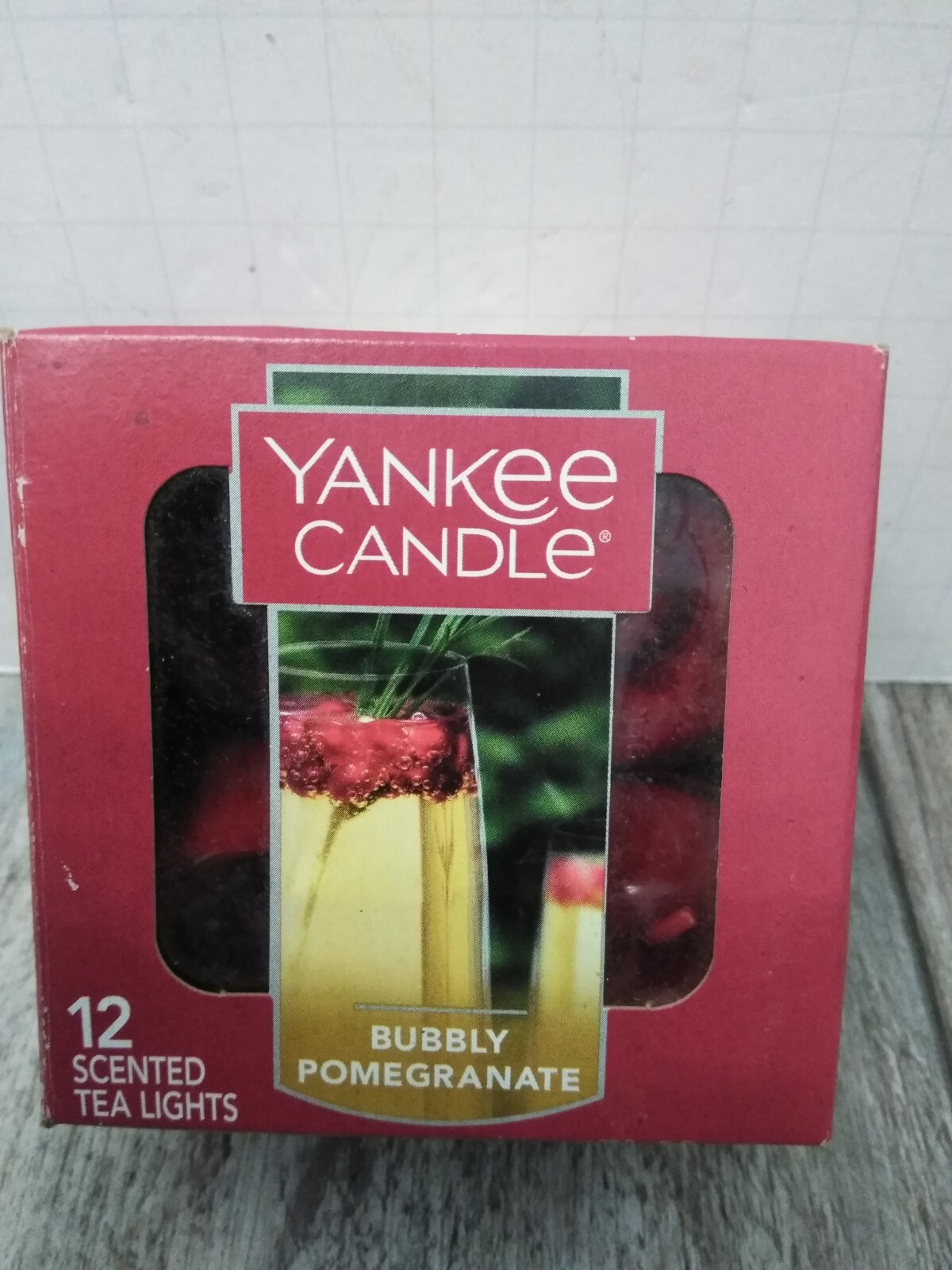 RETIRED YANKEE CANDLE BUBBLY POMEGRANATE TEA LIGHTS (10 UNIT IN BOX)